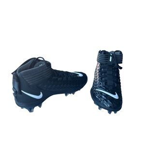 Nike Black and White Athletic Shoes with Cleated Sole